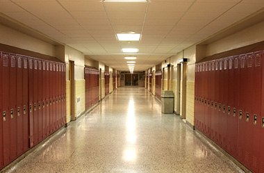 empty high school hallway with lockers